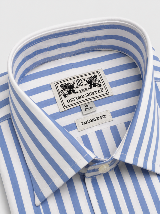 Close-up of a blue and white striped dress shirt collar with visible brand label reading Oxford Shirt Co.