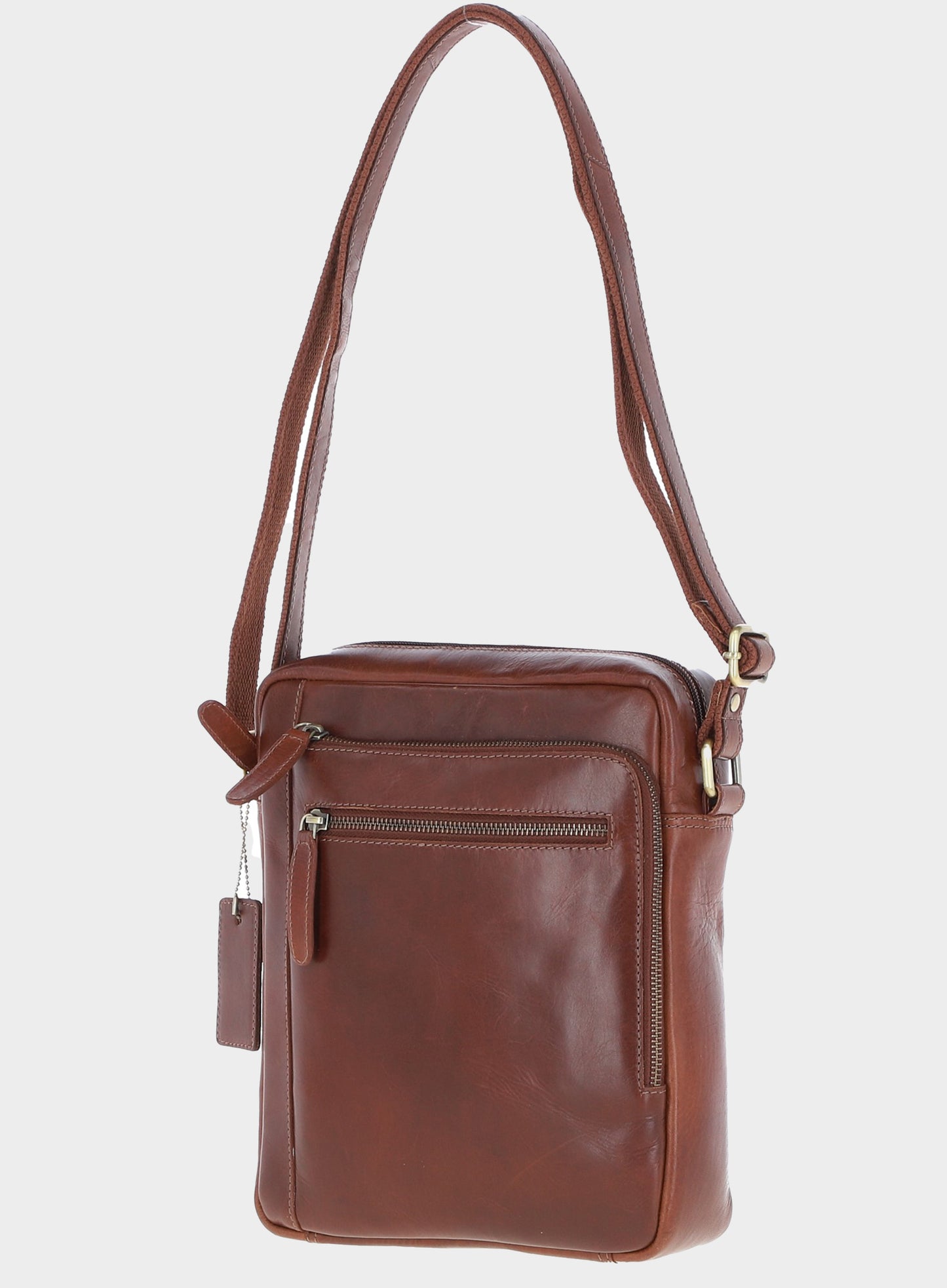 Brown leather crossbody bag on a light gray background