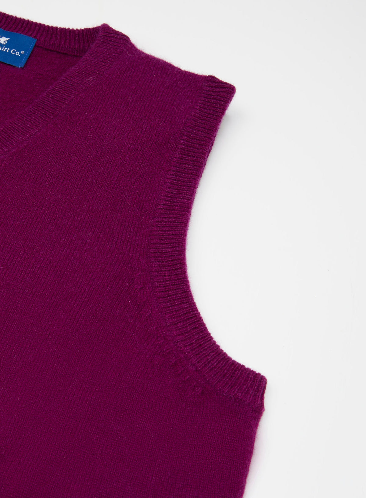Men’s cashmere sleeveless vest in Aubergine.