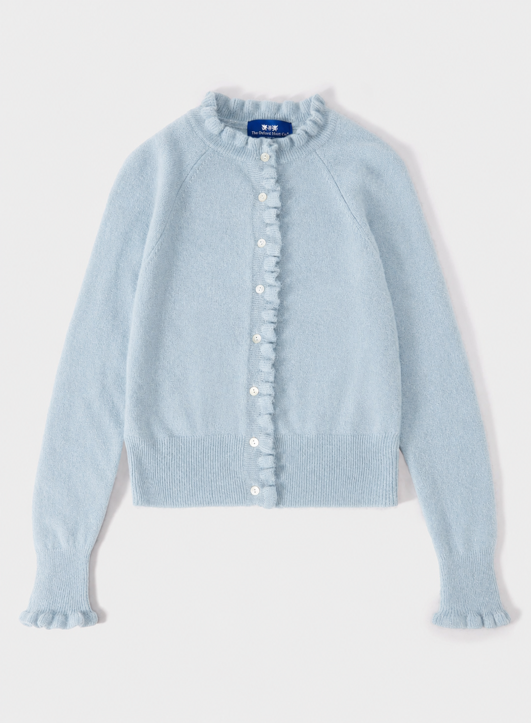 A light blue knit cardigan sweater with a ruffled mock neck, ruffled button placket, and ruffled cuffs, shown flat on a light gray background.