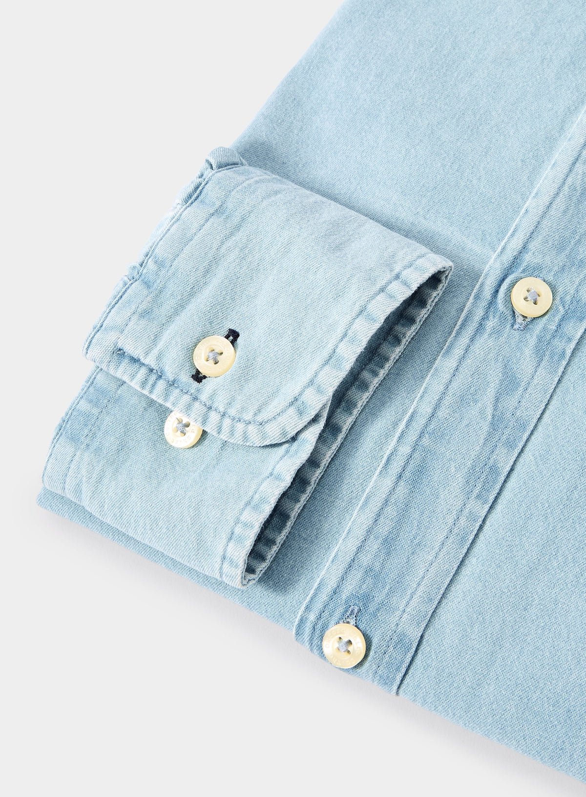 Men’s button-down denim shirt.