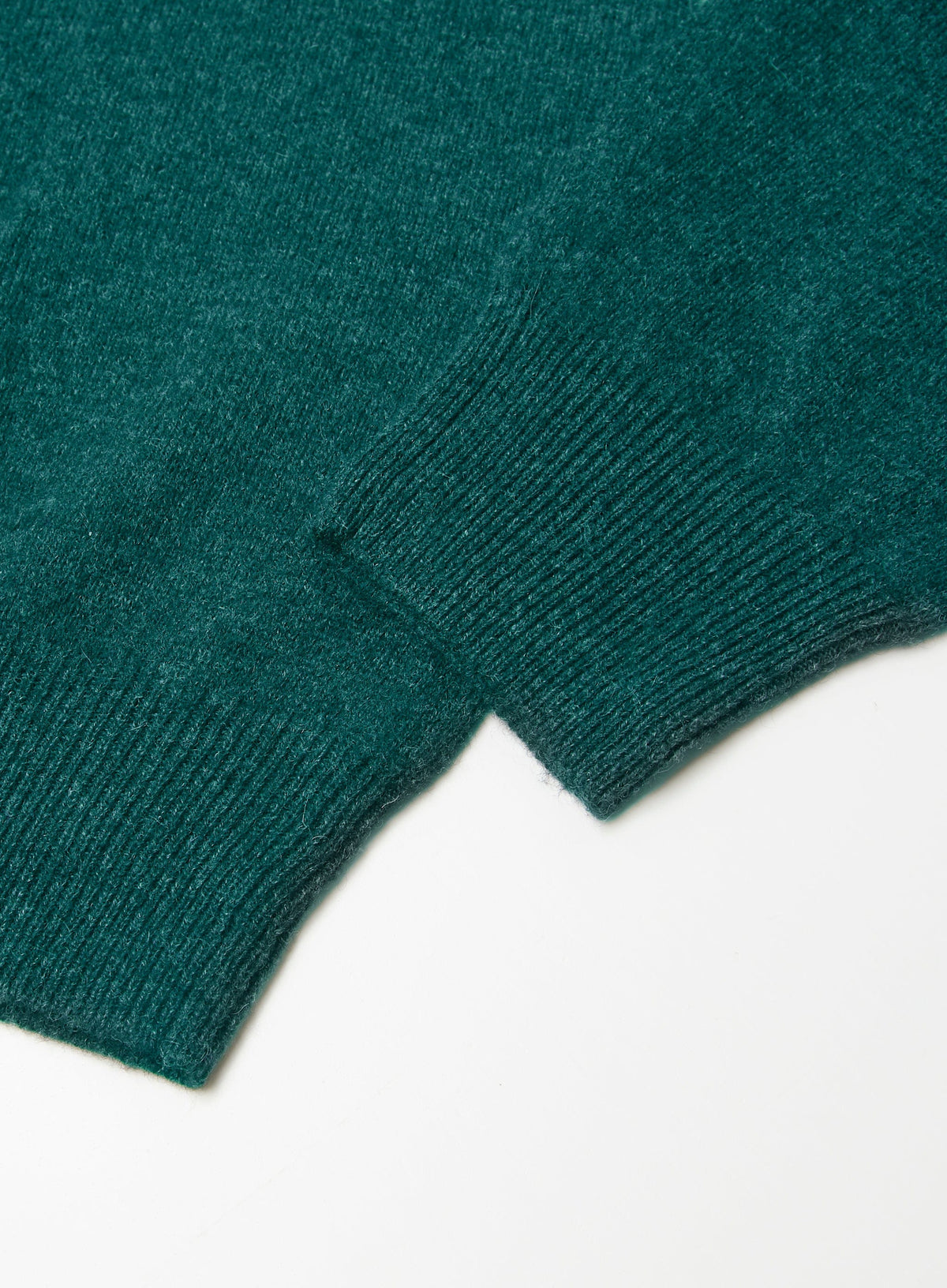 Men’s cashmere quarter zip jumper in Teal.
