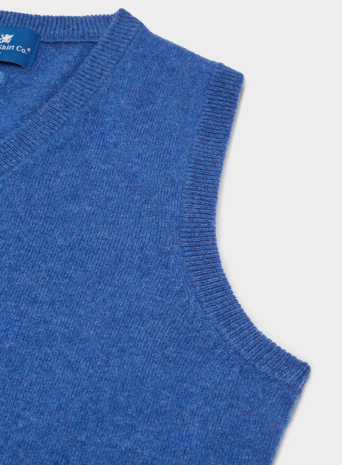 Men’s cashmere sleeveless vest in Denim.