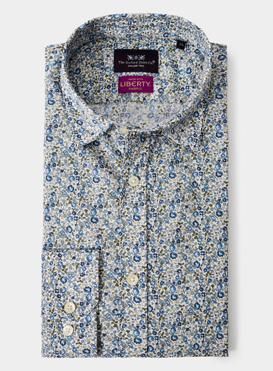 Floral patterned shirt with Liberty label on a white background