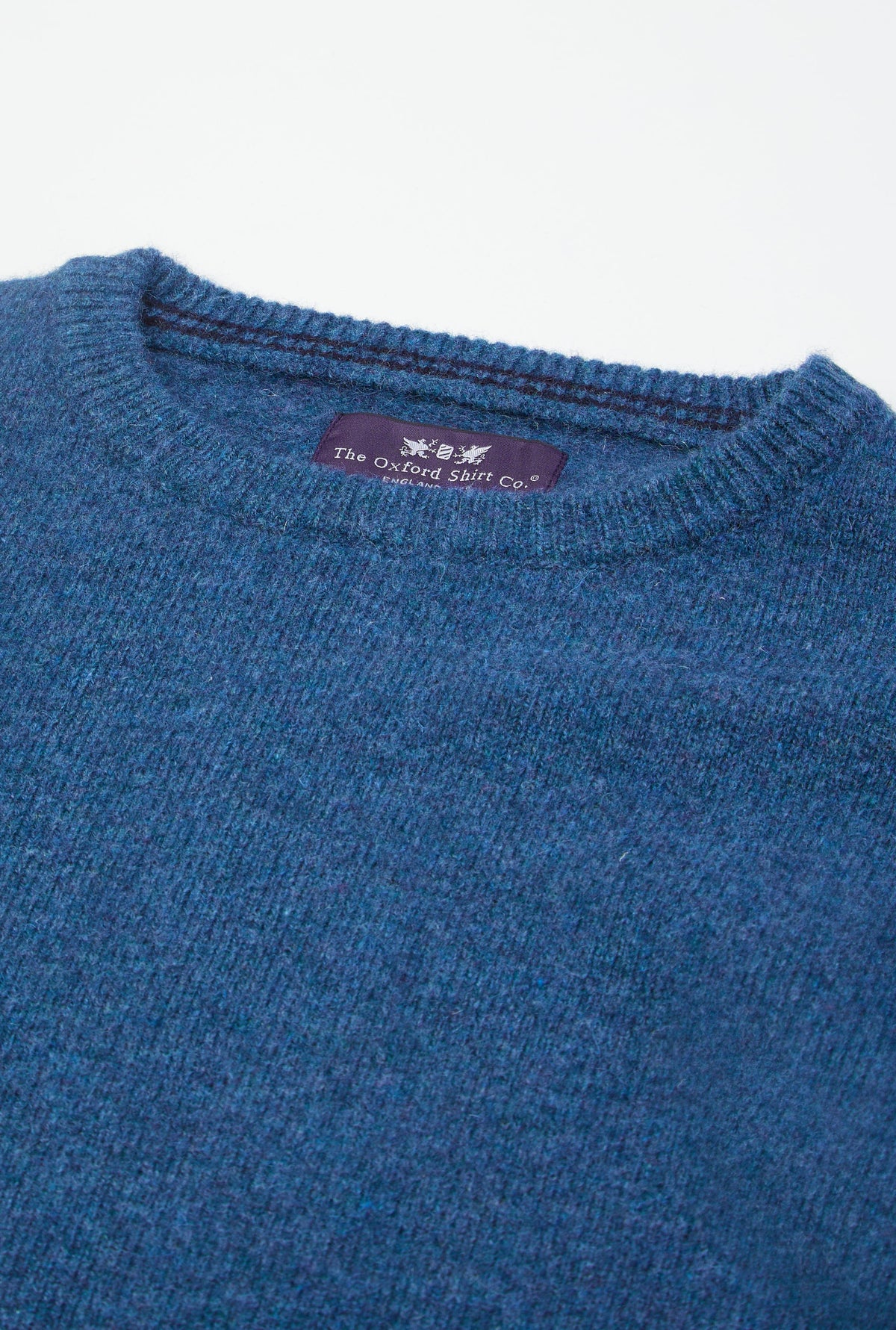 Men’s lambswool crew neck jumper in Blue.