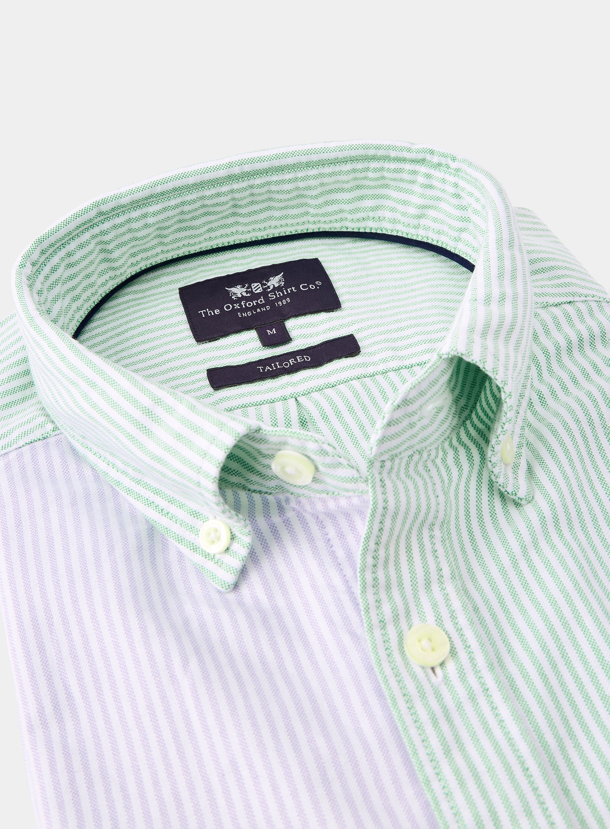 Close-up of men's lilac and green patch stripe Oxford button-down shirt with collar and Tailored Fit label