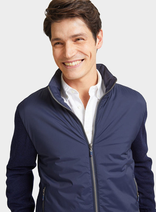 Men’s merino hybrid jacket in Navy.