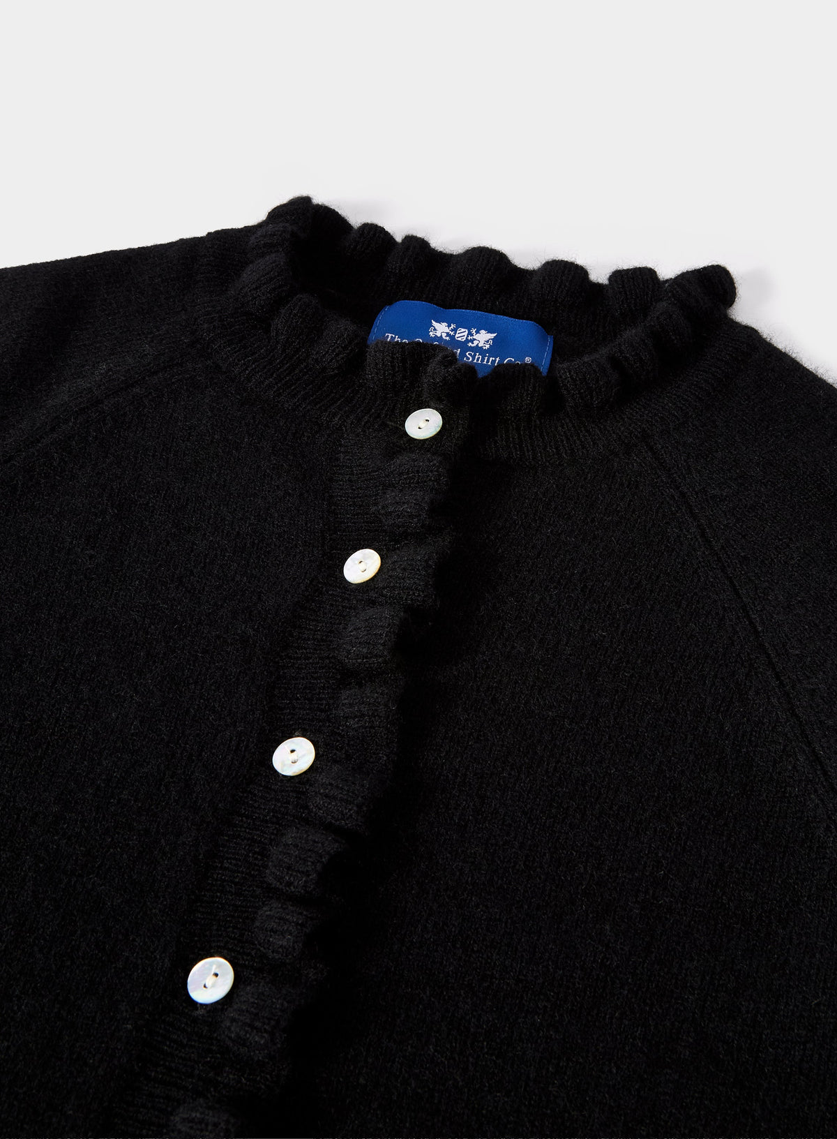 Women’s cashmere frill cardigan in Black.