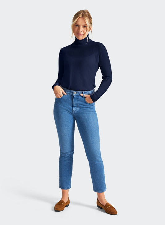 Women’s cashmere roll neck jumper in Navy.