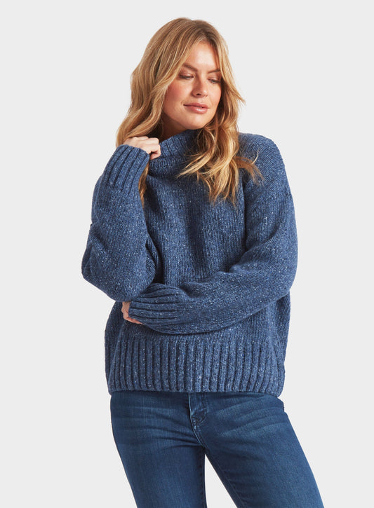 Women’s knitted neppy turtle neck jumper in Denim.