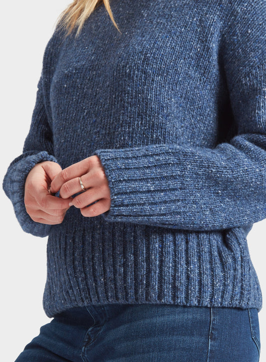 Women’s knitted neppy turtle neck jumper in Denim.