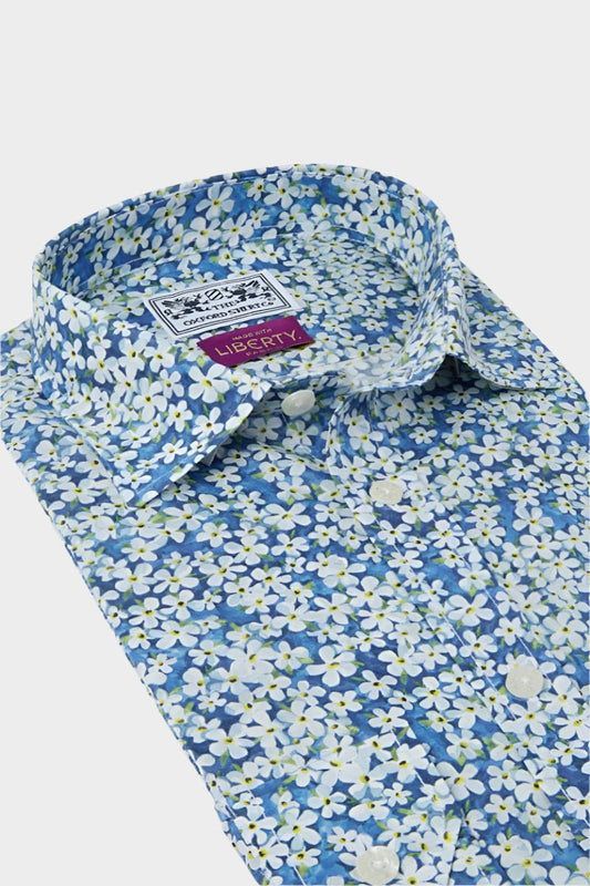 Women’s shirt in Petal Wish Blue Liberty fabric.